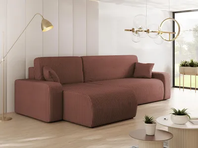A modern living room with a sectional sofa, floor lamp, and coffee table.