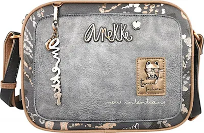 A close-up studio shot of a women's crossbody bag.