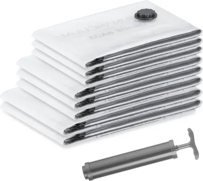 A stack of white vacuum storage bags and a manual pump.