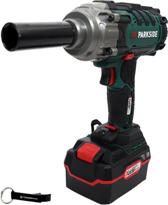 A cordless impact wrench with a battery pack and a keychain.