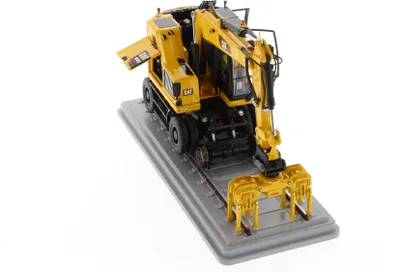 Obrázok produktu pre 85661 Kolesové rýpadlo Cat M323F – verzia v bezpečnostnej žltej farbe, mierka 1:50