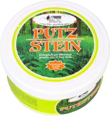 A round container of cleaning product with a nature-themed label.