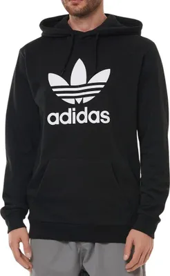 A man wearing an Adidas hoodie.