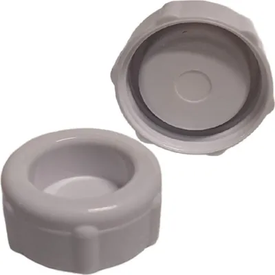 Two white plastic caps are shown against a white background. One cap is in the foreground, and the other is in the background.