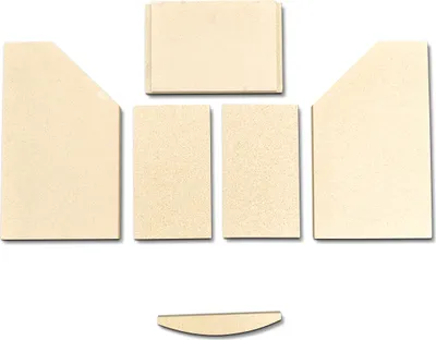 A set of beige ceramic firebricks arranged on a white background.
