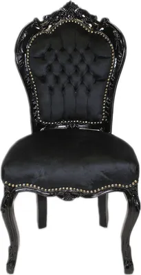 A black baroque-style chair is shown against a white background.