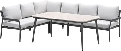 A sectional outdoor sofa and dining table set.