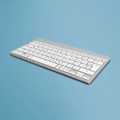 A silver and white ergonomic keyboard is shown on a light blue background.