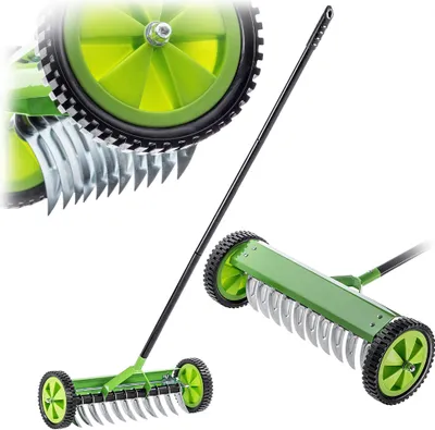 A manual lawn aerator with wheels and a long handle, shown against a white background. A close-up inset shows the tines of the aerator.