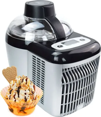 An ice cream maker with a bowl of ice cream in the foreground.
