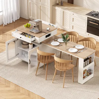 A modern kitchen island with an extendable dining table and chairs, set up for a meal.