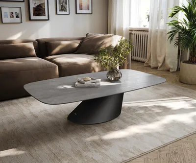 Produktbild von DELIFE Couchtisch Edge Boot 135x80 cm Keramik Beton Grau Conis Metall Schwarz