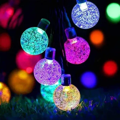 Obrázek produktu pro Sada voděodolných LED světelných řetězů pro vnitřní i venkovní použití, solární napájení, 50 LED diod, délka 7 m, vícebarevné, 8 režimů