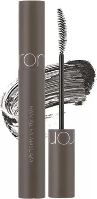 A mascara tube and wand are shown against a white background with a swatch of mascara.