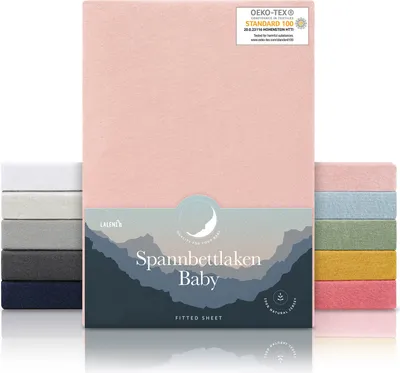 A stack of baby fitted sheets in various colors, with a pink sheet prominently displayed in the center.