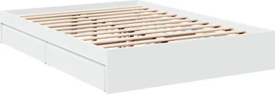 A white bed frame with wooden slats and two drawers is shown from a diagonal angle.