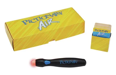A Pictionary Air game set is displayed on a white background, including the game box, a card holder with cards, and the drawing pen.