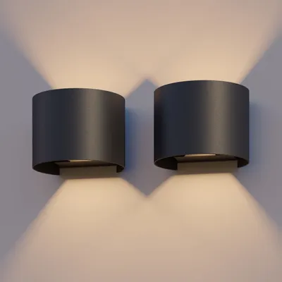 Produktbild von Calex Verona Wandleuchte, für Außen & Innen, warmweißes Up & Down Licht, einstellbarer Lichtstrahl, wasserdicht, Schwarz, 2er Pack