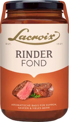 A jar of beef stock with an image of steak on it.