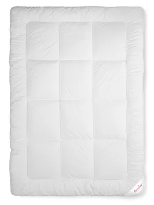 A white comforter or duvet laid flat on a white background.