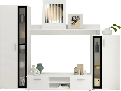 A white modern media wall unit with glass-fronted cabinets and shelves, decorated with artwork and decorative objects.