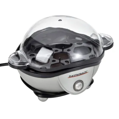 A close-up shot of a silver and clear egg cooker.