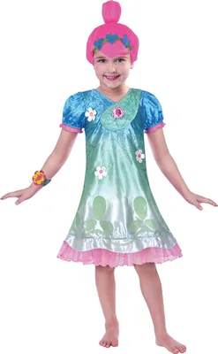 A young girl is posing in a costume.