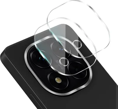 A close-up view of a smartphone camera lens protector being applied to a smartphone.