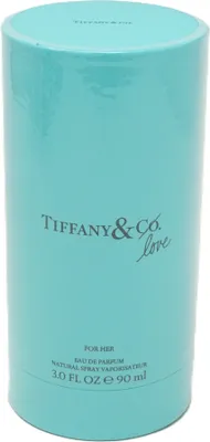 A teal cylindrical box for Tiffany & Co. Love Eau de Parfum.
