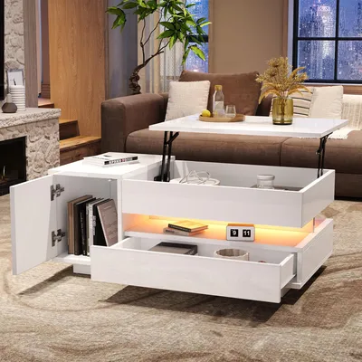 A modern living room with a couch, fireplace, and a white lift-top coffee table with storage.