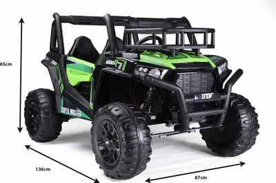 A green and black electric UTV for children, shown from the front-left.