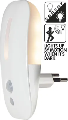 A white motion-activated night light plugged into a wall socket, with illustrative icons and text describing its function.