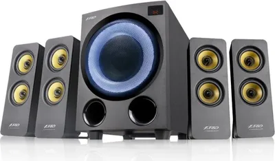 A 4.1 speaker system with a subwoofer and four satellite speakers, displayed on a white background.