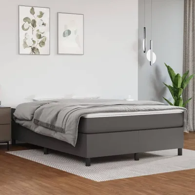 A bedroom scene with a bed as the main focus.
