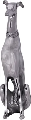 A silver-colored sculpture of a greyhound dog sitting down, presented against a white background.