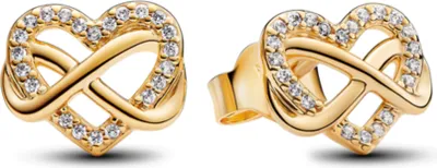 A pair of gold-colored heart-shaped infinity earrings with clear stones, shown against a white background.