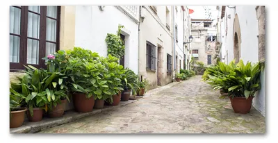 Produktbild von Tulup® Glas-Bild - 100x50 -Wandkunst - Wandbild hinter gehärtetem Sicherheitsglas  - Sehenswürdigkeiten & Architektur - Schöne Gasse - Grün