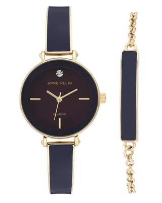 Produktbild von Damenuhr lila / gold mit Metall-Armband
