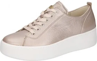 A single beige sneaker with a white sole is shown from a side-angle against a white background.