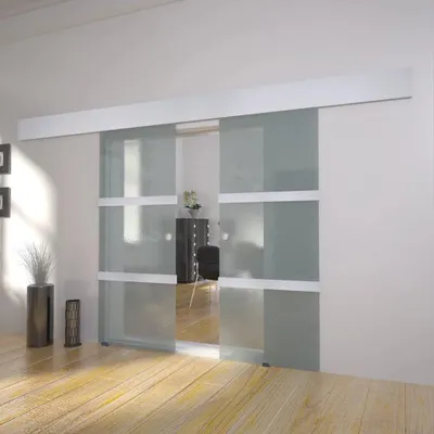 A modern interior with glass sliding doors.