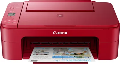 A red Canon PIXMA TS3352 printer is shown from the front, with a sheet of paper partially printed with wedding-related images and text emerging from the output tray.