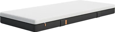 A mattress is shown from a diagonal angle against a white background.