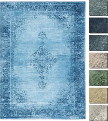 A blue vintage-style rug with a detailed pattern is displayed on a white background. To the right, there are several smaller swatches of different rug colors and patterns.