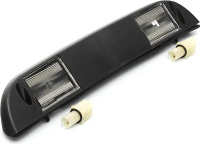 A black license plate light assembly with two clear lenses and two white connectors is shown against a white background.
