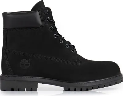 A black Timberland boot is shown against a white background.