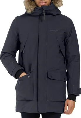 A man wearing a navy blue parka jacket with a fur-lined hood.