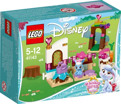 The image shows the packaging of a LEGO Disney Princess toy set, featuring a cartoonish depiction of the toy's contents and characters in a whimsical outdoor setting.