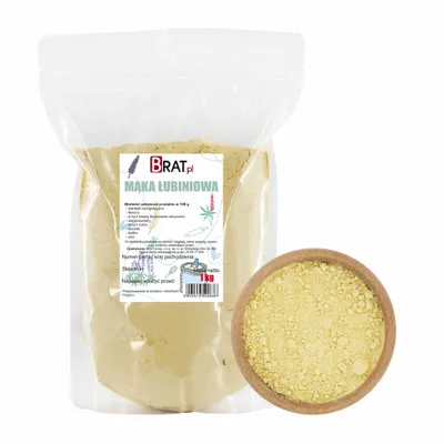 A bag of lupine flour next to a wooden bowl filled with the same flour.