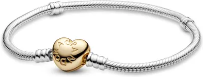 A close-up studio shot of a Pandora bracelet with a heart-shaped clasp.