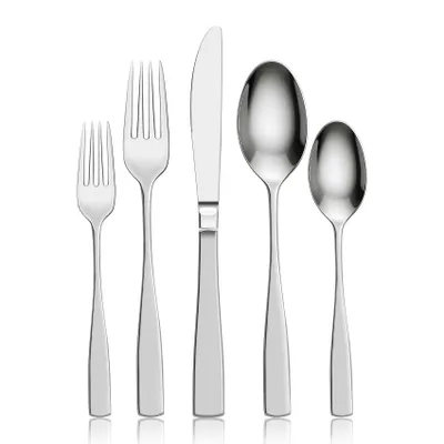 A set of cutlery arranged on a white background.